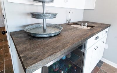 Reclaimed wood countertop on custom white cabinets - left