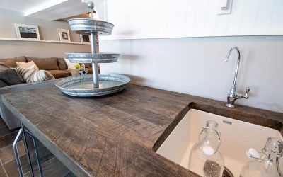 Reclaimed wood countertop on custom white cabinets - right