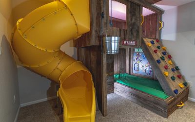 Barnwood loft bed with slide and climbing wall