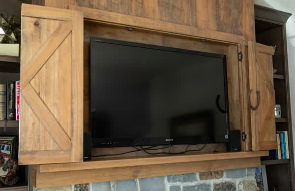 Custom Cabinets - Rustic TV Cabinet above Fireplace
