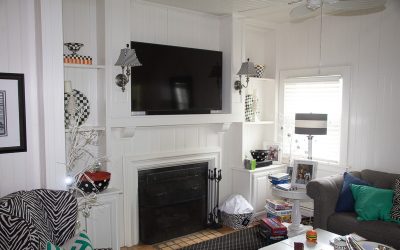 White mantle and built-in cabinets / bookcases
