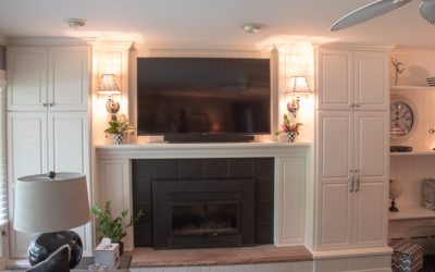 White mantle and built-in cabinets / bookcases - head on
