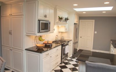 White Custom Cabinets in Checkerboard Kitchen - Cooking Appliances