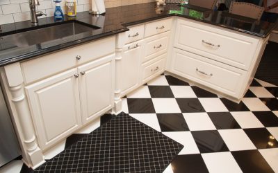 White Custom Cabinets in Checkerboard Kitchen - L-Shaped Base Cabinets